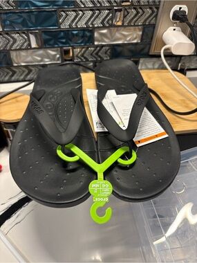 CROCS Men's Black Flip-Flops with Neon Green Hanger
